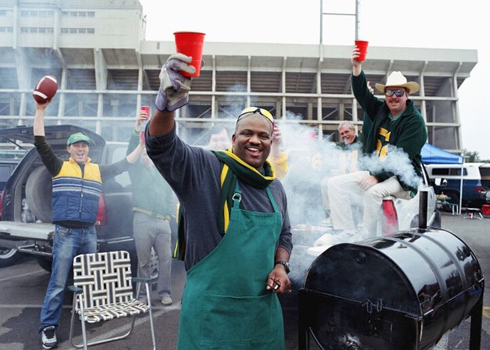 GettyImages-200118084-003_Men Tailgating with Red Retail Cups_scaled